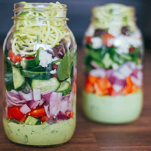 An Easy Way to Eating Vegetables is to make a salad in a jar ready to grab and go on a busy day. 