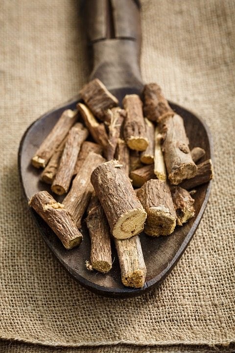 The herb licorice root which looks like tree branches in a spoon. This is another herb used in treating adrenal fatigue. 