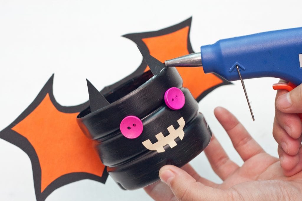 Halloween DIY Craft: Trick or Treat Basket Step 13 glue on the horns.