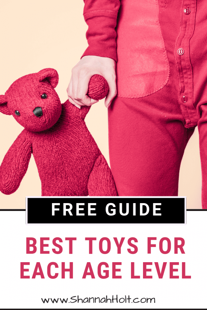 Child holding teddy bear by the arm with text Free Guide Best Toys for Kids for Each Age Level