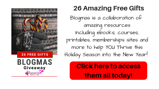Image of a woman holding candy canes with text 26 Free gifts Blogmas giveaway click here to access them all today! Blogmas is a collaboration of amazing resources to help you thrive this holiday season into the new year. 