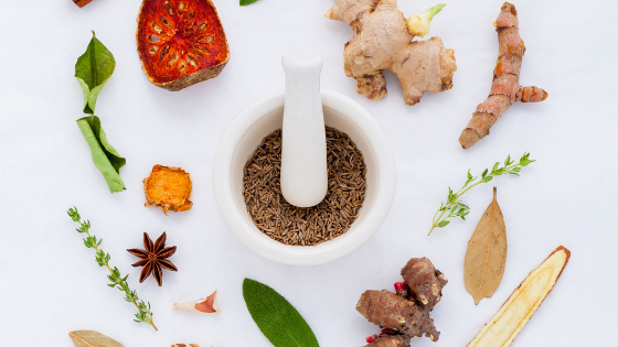 A variety of adaptogens on a table beting prepared to use for your health.